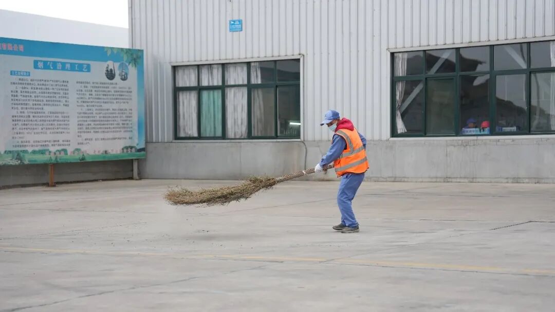 Employee carrying out a glassware production task