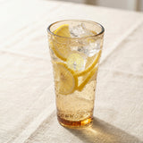 Sienna Glow amber borosilicate glass tumbler with gold Cupid decal available in 12oz and 17oz sizes.SOLA & SIENNA