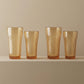 Sienna Glow ribbed amber glass tumbler in 12oz and 17oz sizes made of heat-resistant high borosilicate glass.SOLA & SIENNA