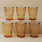 Sienna Glow ribbed amber glass tumbler made of heat-resistant borosilicate glass with elegant vertical texture.SOLA & SIENNA