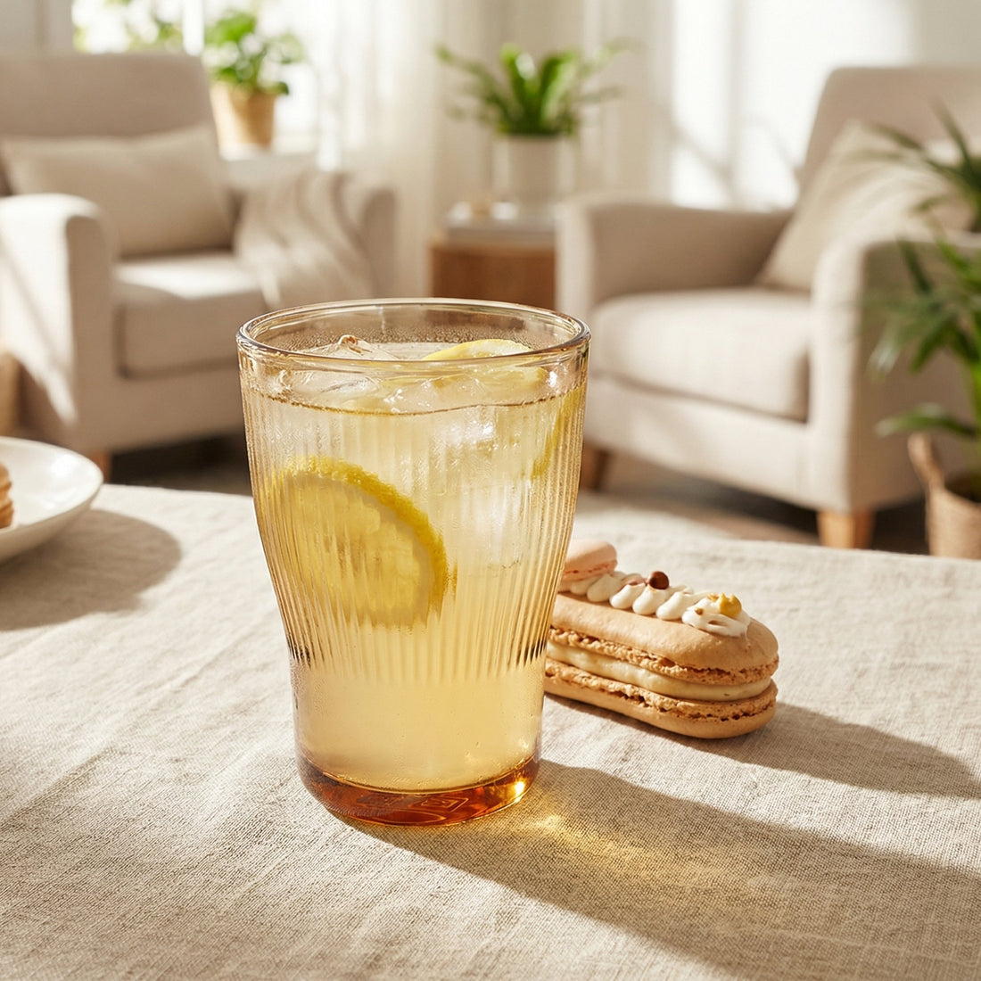 Sienna Glow ribbed amber glass tumbler made of heat-resistant borosilicate glass with elegant vertical texture.SOLA & SIENNA